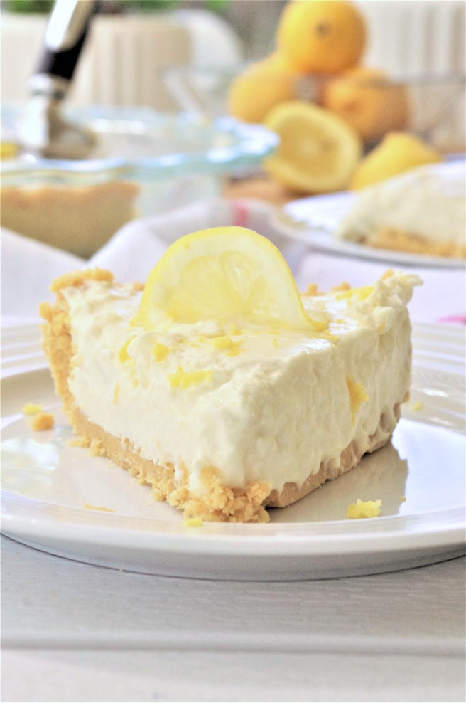 Easy-No-Bake-Lemon-Cheesecake-Ice-Box-Pie-with-Lemon-Oreo-Crust-Dessert-Recipe-Served-via-Dreaming-in-DIY